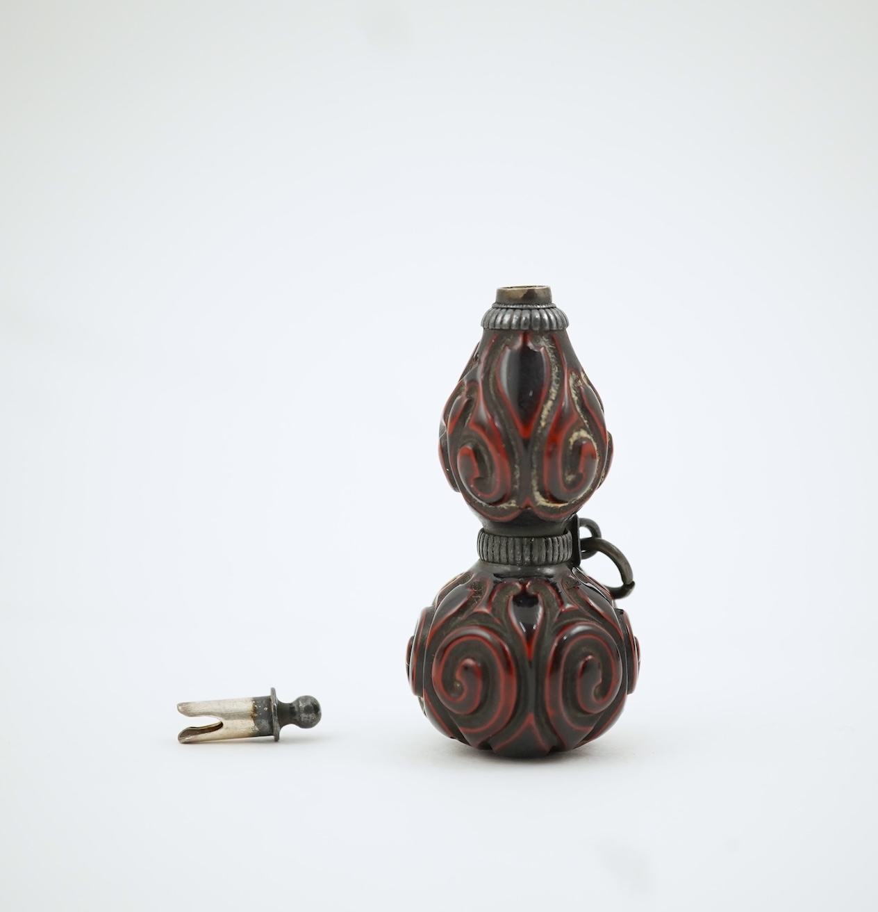 A Japanese guribori lacquer double gourd shaped netsuke, Edo period, late 18th/early 19th century